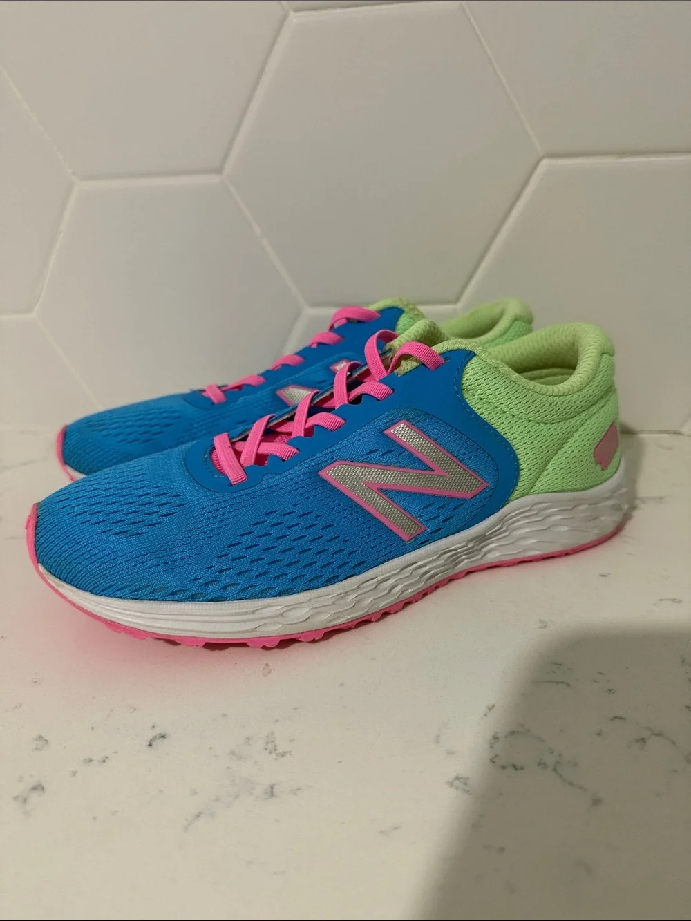 New Balance Kids Blue Sneakers with Neon Green Collar and Pink Details